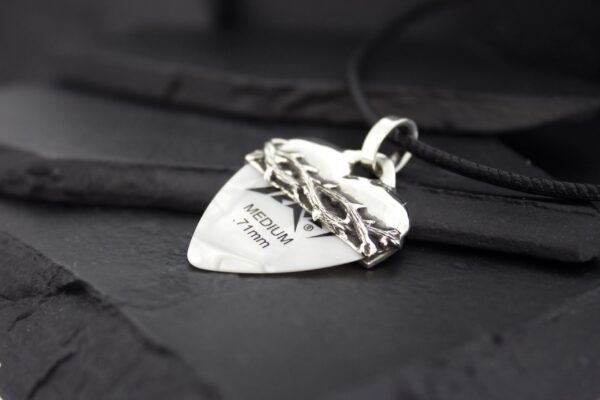Silver heart-shaped pendant with a crown design, engraved with "Chrome Hearts."