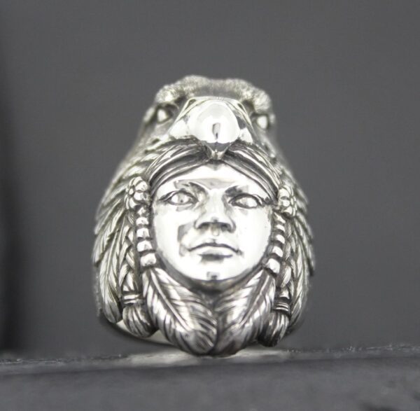 Silver ring with a detailed Native American chief face design.