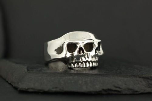 Silver ring designed as a double-layered skull.