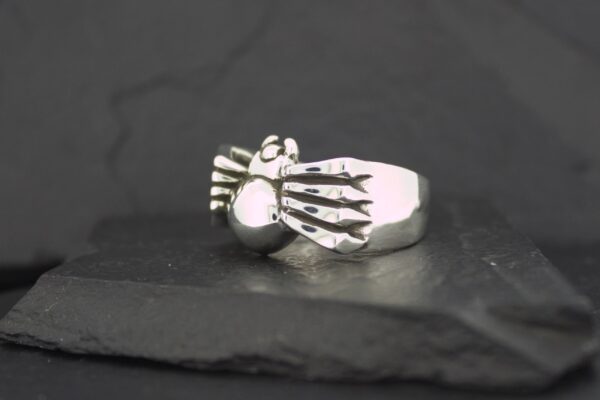 Silver ring with a spider design.