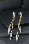 Elegant star and geometric dangle earrings with gold chains.