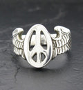 Silver ring with peace symbol and wing designs.