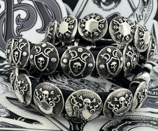 Metal rings with skull and crossbones designs.