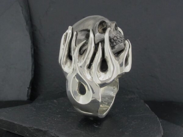 Unique silver ring with an abstract, organic design.