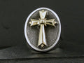 Silver ring with a raised cross design on a textured oval background.