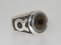 A silver ring with a realistic human eye design.