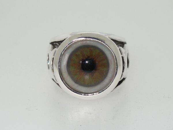 A ring featuring a realistic human eye design.