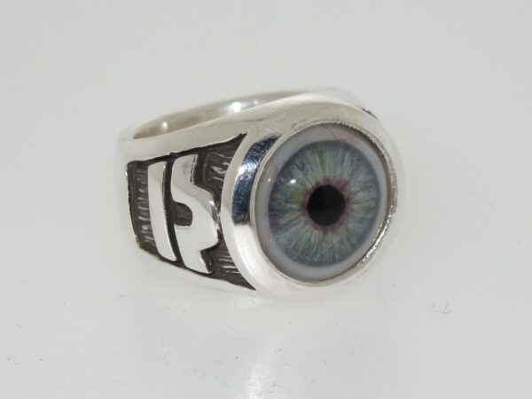 Silver ring with a realistic blue eye design.