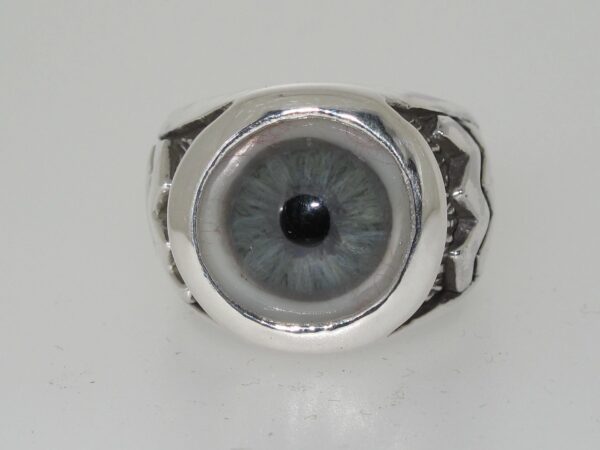 A ring featuring a realistic human eye design.