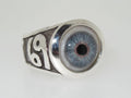 A silver ring with a detailed blue eye design and the number 69 on the side.
