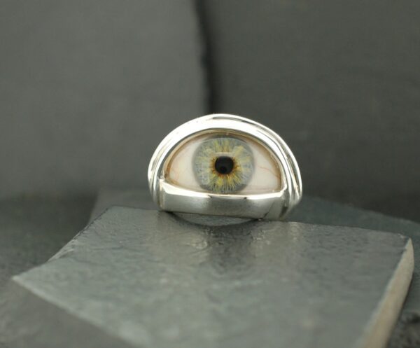 A ring with a realistic human eye design.