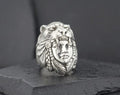 Silver ring featuring a Native American chief wearing a bear headdress.