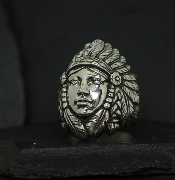 Silver ring featuring a detailed Native American chief's head.