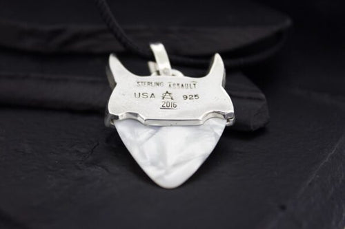 Vintage white porcelain heart-shaped pendant with inscriptions.