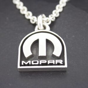 Silver Mopar logo pendant on a chain.