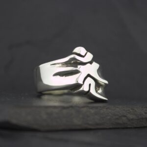 Silver ring featuring a stylized flame design.
