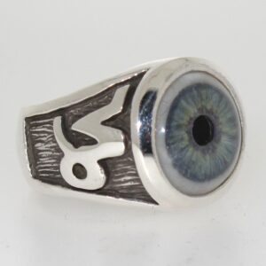 A silver ring with a detailed blue eye design and an engraved symbol.