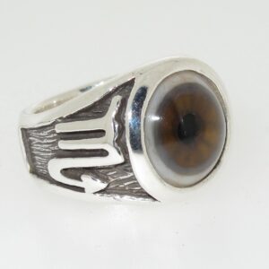 A silver ring with a large, brown, round gemstone.